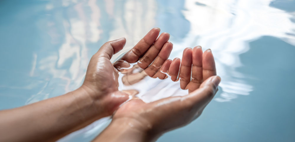 Water Positive Homes – Sustainable Luxury Living Water positive home design featuring green landscaping, and sustainable architecture